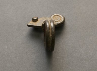 Senufo. <em>Ring with Chameleon</em>, early 20th century. Bronze, 1 9/16 x 1 3/8 x 13/16 in. (4 x 3.5 x 2 cm). Brooklyn Museum, Gift of Jerome Vogel, 2012.76.11. Creative Commons-BY (Photo: Brooklyn Museum, 2012.76.11_PS10.jpg)
