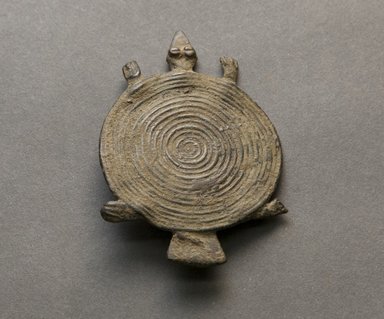 Senufo. <em>Turtle Pendant</em>, early 20th century. Bronze, 3/16 x 1 7/8 x 2 11/16 in. (0.5 x 4.8 x 6.8 cm). Brooklyn Museum, Gift of Jerome Vogel, 2012.76.15. Creative Commons-BY (Photo: Brooklyn Museum, 2012.76.15_PS10.jpg)