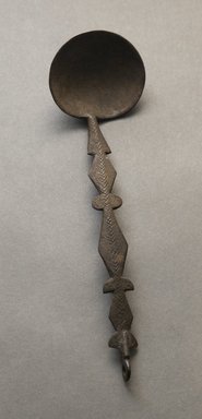Senufo. <em>Spoon</em>, early 20th century. Iron, 6 7/8 x 1 15/16 x 6 1/2 in. (17.5 x 5 x 16.5 cm). Brooklyn Museum, Gift of Jerome Vogel, 2012.76.1. Creative Commons-BY (Photo: Brooklyn Museum, 2012.76.1_PS10.jpg)