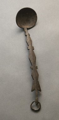 Senufo. <em>Spoon</em>, early 20th century. Iron, 7 1/2 x 1 9/16 x 6 11/16 in. (19 x 4 x 17 cm). Brooklyn Museum, Gift of Jerome Vogel, 2012.76.2. Creative Commons-BY (Photo: Brooklyn Museum, 2012.76.2_PS10.jpg)