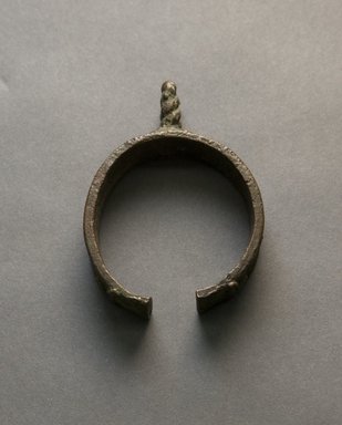Senufo. <em>Bracelet with Plant Forms</em>, early 20th century. Bronze, 3 1/4 x 2 3/8 x 5/8 in. (8.2 x 6.1 x 1.6 cm). Brooklyn Museum, Gift of Jerome Vogel, 2012.76.3. Creative Commons-BY (Photo: Brooklyn Museum, 2012.76.3_front_PS10.jpg)