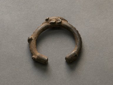Senufo. <em>Bracelet with Crocodile</em>, early 20th century. Bronze, 3/8 x 2 in. (1 x 5.1 cm). Brooklyn Museum, Gift of Jerome Vogel, 2012.76.8. Creative Commons-BY (Photo: Brooklyn Museum, 2012.76.8_PS10.jpg)