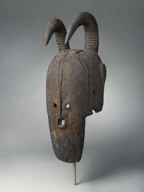 Bobo. <em>Mask (Nyanga)</em>, early 19th century. Wood, metal, height: 20 1/2 in. (52.1 cm). Brooklyn Museum, Purchase gift of various donors in memory of Jerry Vogel and gift of Mr. and Mrs. J. Gordon Douglas III, by exchange, 2015.41.1 (Photo: Brooklyn Museum, 2015.41.1_threequarter_PS4.jpg)