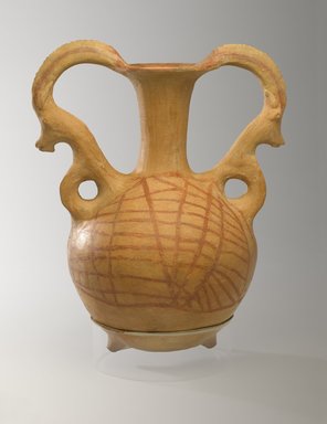  <em>Twin-Spouted Vessel with Mountain Goat Handles</em>, 250-100 B.C.E. Clay, slip, height 13 1/16 x diam. 10 1/2 x width 8 1/16 in. (33.1 x 26.6 x 20.4 cm). Brooklyn Museum, Gift of the Arthur M. Sackler Foundation, NYC, in memory of James F. Romano, 2015.65.14. Creative Commons-BY (Photo: Brooklyn Museum, 2015.65.14_PS9.jpg)