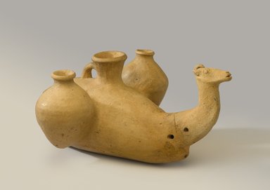  <em>Vessel in the Form of a Recumbent Camel with Jugs</em>, 250 B.C.E.–224 C.E. Clay, 5 7/8 x 10 1/4 x 13 1/4 in. (15 x 26 x 33.6 cm). Brooklyn Museum, Gift of the Arthur M. Sackler Foundation, NYC, in memory of James F. Romano, 2015.65.15. Creative Commons-BY (Photo: Brooklyn Museum, 2015.65.15_PS9.jpg)