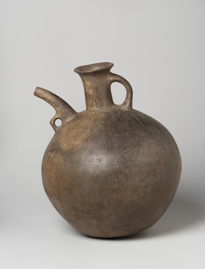  <em>Spouted Vessel</em>, 1st millennium B.C.E. Clay, slip, 9 13/16 x Diam. 7 7/8 in. (25 x 20 cm). Brooklyn Museum, Gift of the Arthur M. Sackler Foundation, NYC, in memory of James F. Romano, 2015.65.22. Creative Commons-BY (Photo: Brooklyn Museum, 2015.65.22_view01_PS11.jpg)