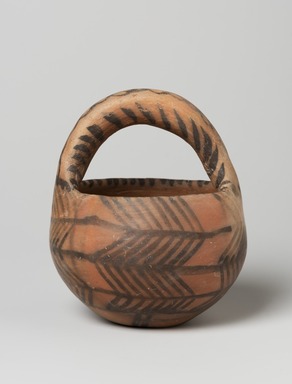  <em>Painted Cup with Basket Handle</em>, ca. 4500-3000 B.C.E. Ceramic, slip, 5 1/2 x Diam. 4 1/2 in. (14 x 11.5 cm). Brooklyn Museum, Gift of the Arthur M. Sackler Foundation, NYC, in memory of James F. Romano, 2015.65.27. Creative Commons-BY (Photo: Brooklyn Museum, 2015.65.27_view01_PS11.jpg)