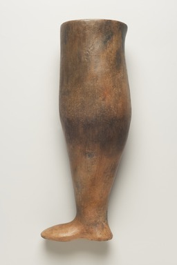 Ancient Near Eastern. <em>Foot-Shaped Vessel</em>, ca. 800–600 B.C.E. Clay, slip, 13 3/16 x length of foot 4 3/4 in. (33.5 x 12 cm). Brooklyn Museum, Gift of the Arthur M. Sackler Foundation, NYC, in memory of James F. Romano, 2015.65.31. Creative Commons-BY (Photo: Brooklyn Museum, 2015.65.31_view01_PS11.jpg)