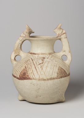  <em>Twin-Spouted Vessel with Theriomorphic Handles</em>, 3rd–2nd century B.C.E. Clay, slip, 9 13/16 x Diam. 6 11/16 in. (25 x 17 cm). Brooklyn Museum, Gift of the Arthur M. Sackler Foundation, NYC, in memory of James F. Romano, 2015.65.3. Creative Commons-BY (Photo: Brooklyn Museum, 2015.65.3_view01_PS11.jpg)