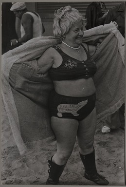 Fred McDarrah (1926–2007, American, b. Brooklyn, NY). <em>Martha Gronski, a member of the Coney Island Polar Bear Club, prepares for a swim in the ocean, December 3, 1972</em>, 12/3/1972. Gelatin silver print (vintage), sheet: 16 × 20 in. (40.6 × 50.8 cm). Brooklyn Museum, Gift from the Goldman-Sonnenfeldt Family, 2023.69.6. © artist or artist's estate (Photo: Brooklyn Museum, 2023.69.6_PS11.jpg)