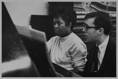 Milt Hinton (born Vicksburg Mississippi, active Chicago, IL, 1910–2000). <em>Sarah Vaughan and Bob James, recording studio, N.Y.C.</em>, ca. 1967. Gelatin silver print, 11 × 14 in. (27.9 × 35.6 cm). Brooklyn Museum, Gift of David Berger and Holly Maxson, 2023.80.11 (Photo: Brooklyn Museum, 2023.80.11_PS20.jpg)