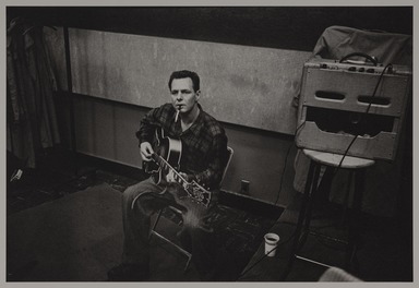 Milt Hinton (born Vicksburg Mississippi, active Chicago, IL, 1910–2000). <em>Barry Galbraith, recording studio, N.Y.C.</em>, ca. 1960. Gelatin silver print, 11 × 14 in. (27.9 × 35.6 cm). Brooklyn Museum, Gift of David Berger and Holly Maxson, 2023.80.16 (Photo: Brooklyn Museum, 2023.80.16_PS20.jpg)