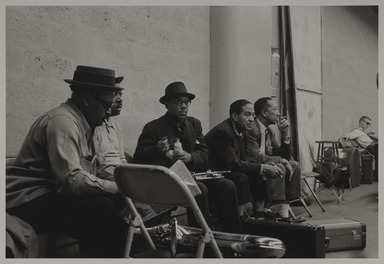 Milt Hinton (born Vicksburg Mississippi, active Chicago, IL, 1910–2000). <em>Ben Webster, Count Basie, Roy Eldridge, Dickie Wells, Doc Cheatham, Gerry Mulligan, television studio, (Sound of Jazz rehearsal), N.Y.C.</em>, 1957. Gelatin silver print, 11 × 14 in. (27.9 × 35.6 cm). Brooklyn Museum, Gift of David Berger and Holly Maxson, 2023.80.17 (Photo: Brooklyn Museum, 2023.80.17_PS20.jpg)