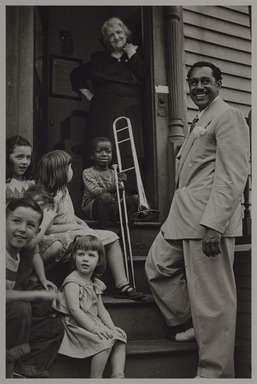 Milt Hinton (born Vicksburg Mississippi, active Chicago, IL, 1910–2000). <em>Cab Calloway with kids and winner of Calloway Quizzical radio contest, Providence, RI</em>, ca. 1941. Gelatin silver print, 11 × 14 in. (27.9 × 35.6 cm). Brooklyn Museum, Gift of David Berger and Holly Maxson, 2023.80.5 (Photo: Brooklyn Museum, 2023.80.5_PS20.jpg)