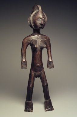 Bamana. <em>Figure of a Standing Female (Nyeleni)</em>, late 19th or early 20th century. Wood, metal, shells, 20 3/4 x 6 1/2 x 7in. (52.7 x 16.5 x 17.8cm). Brooklyn Museum, Museum Expedition 1922, Robert B. Woodward Memorial Fund, 22.1094. Creative Commons-BY (Photo: Brooklyn Museum, 22.1094.jpg)