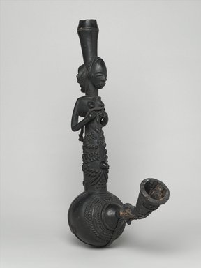Luba. <em>Water Pipe</em>, 19th century. Wood, leather, clay, 23 x 3 3/4 x 9 in. (58.4 x 9.5 x 22.9 cm). Brooklyn Museum, Brooklyn Museum Collection, 22.1108a-b. Creative Commons-BY (Photo: Brooklyn Museum, 22.1108a-b_PS2.jpg)