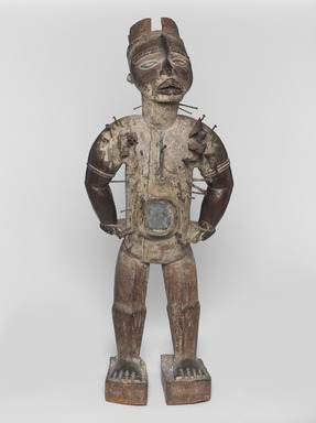 Kakongo artist. <em>Power Figure (Nkisi Nkondi)</em>, 19th century, with 20th century restoration. Wood, iron, glass, resin, kaolin, pigment, plant fiber, cloth, 33 7/8 x 13 3/4 x 11 in. (86 x 34.9 x 27.9 cm). Brooklyn Museum, Museum Expedition 1922, Robert B. Woodward Memorial Fund, 22.1421. Creative Commons-BY (Photo: , 22.1421_overall_PS9.jpg)