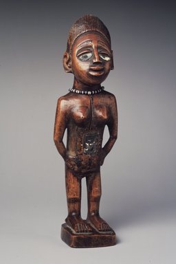Kongo. <em>Standing Female Figure (Nkisi)</em>, 19th century. Wood, glass mirror, plastic beads, cotton cordage, applied materials, 9 x 2 3/4 x 2 1/2 in. (22.9 x 7.0 x 6.4 cm). Brooklyn Museum, Museum Expedition 1922, Robert B. Woodward Memorial Fund, 22.1444. Creative Commons-BY (Photo: Brooklyn Museum, 22.1444.jpg)