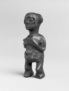 Mbala. <em>Standing Female Figure</em>, 19th or early 20th century. Wood, fiber, organic materials, 6 7/8 x 2 1/4 x 2in. (17.5 x 5.7 x 5.1cm). Brooklyn Museum, Museum Expedition 1922, Robert B. Woodward Memorial Fund, 22.1451. Creative Commons-BY (Photo: Brooklyn Museum, 22.1451_bw.jpg)