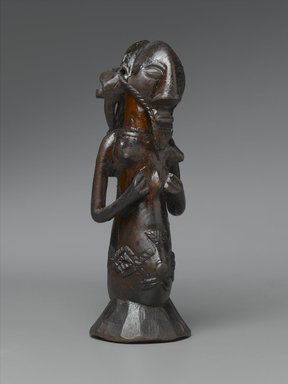 Luba. <em>Kabwelulu Gourd Figure</em>, 19th century. Wood, metal, 7 3/4 x 2 7/8 x 2 3/4 in. (19.7 x 7.3 x 7 cm). Brooklyn Museum, Museum Expedition 1922, Robert B. Woodward Memorial Fund, 22.1454. Creative Commons-BY (Photo: Brooklyn Museum, 22.1454_threequarter_PS2.jpg)