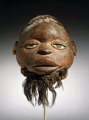 Makonde artist. <em>Mask (lipiko)</em>, 19th century. Wood, human hair, fiber, pigment, 13 x 10 1/4 x 11 1/4 in. (33 x 26 x 28.6 cm). Brooklyn Museum, Museum Expedition 1922, Robert B. Woodward Memorial Fund, 22.1588. Creative Commons-BY (Photo: Brooklyn Museum, 22.1588_front_SL1.jpg)