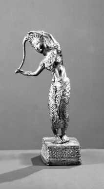  <em>Standing Figure</em>, 19th century (probably). Gilt bronze, 7 1/16 in. (18 cm). Brooklyn Museum, Robert B. Woodward Memorial Fund, 22.1972.25078. Creative Commons-BY (Photo: Brooklyn Museum, 22.1972.25078_front_bw.JPG)