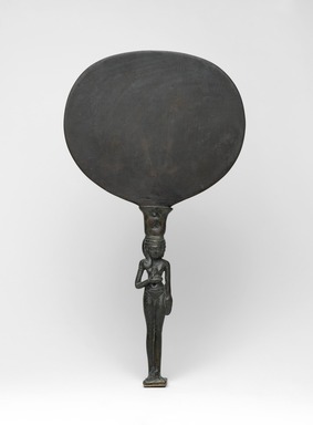  <em>Mirror Disk</em>, ca. 1352–1336 B.C.E. Bronze, 6 1/8 x 5 9/16 x 1 in. (15.5 x 14.2 x 2.6 cm) . Brooklyn Museum, Gift of the Egypt Exploration Society, 25.886.1. Creative Commons-BY (Photo: Brooklyn Museum, 25.886.1_60.100_front_PS2.jpg)