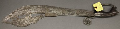Fon. <em>Ceremonial sword (gubasa)</em>, late 19th-early 20th century. Iron, wood, 27 1/16 x 5 in. (68.7 x 12.7 cm). Brooklyn Museum, Robert B. Woodward Memorial Fund, 25696. Creative Commons-BY (Photo: Brooklyn Museum, 25696_PS10.jpg)