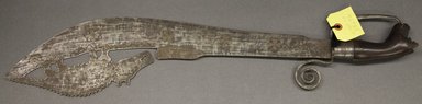 Fon. <em>Ceremonial sword (gubasa)</em>, late 19th–early 20th century. Iron, wood, 27 1/16 x 5 in. (68.7 x 12.7 cm). Brooklyn Museum, Robert B. Woodward Memorial Fund, 25696. Creative Commons-BY (Photo: Brooklyn Museum, 25696_PS10.jpg)