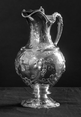 William Gale & Son (American, active New York, 1850-1866). <em>Urn-shaped Creamer (Part of 4-piece Tea Service)</em>, 1852. Silver, 8 7/16 in. (21.5 cm). Brooklyn Museum, Gift of Frances Elizabeth Wood, 26.434.2. Creative Commons-BY (Photo: Brooklyn Museum, 26.434.2_acetate_bw.jpg)