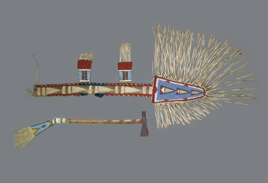 Crow. <em>Spear Case</em>, late 19th century. Hide, beads, wool, cloth, with fringe: 59 1/2 x 20 in. (151.1 x 50.8 cm). Brooklyn Museum, Robert B. Woodward Memorial Fund, 26.792. Creative Commons-BY (Photo: , 26.792_26.802_PS1.jpg)