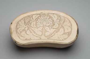  <em>Pillow</em>, 960-1279. Cizhou ware: glazed stoneware with scraffito decoration, 4 3/4 x 11 x 14 1/2 in. (12.1 x 28 x 36.8 cm). Brooklyn Museum, Museum Collection Fund, 27.336. Creative Commons-BY (Photo: Brooklyn Museum, 27.336_PS2.jpg)