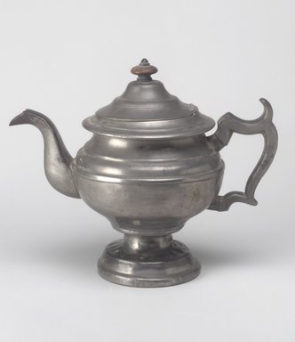 Unknown. <em>Teapot</em>, mid-19th century. Pewter, wood, 8 3/8 x 10 1/4 x 5 3/4 in. (21.3 x 26 x 14.6 cm). Brooklyn Museum, Gift of Mrs. Samuel Doughty, 27.457. Creative Commons-BY (Photo: Brooklyn Museum, 27.457.jpg)