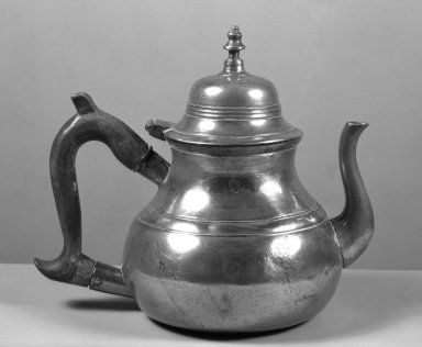  <em>Teapot</em>, early 18th century. Pewter, Wood, 7 1/8 x 3 3/8 in. (18.1 x 8.6 cm). Brooklyn Museum, Gift of Mrs. Samuel Doughty, 27.559. Creative Commons-BY (Photo: Brooklyn Museum, 27.559_acetate_bw.jpg)