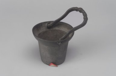 Unknown. <em>Pail with Handle</em>, 19th century. Pewter, With handle upright: 4 3/8 x 2 3/4 x 2 3/4 in. (11.1 x 7 x 7 cm). Brooklyn Museum, Gift of Mrs. Samuel Doughty, 27.604. Creative Commons-BY (Photo: Brooklyn Museum, 27.604.jpg)