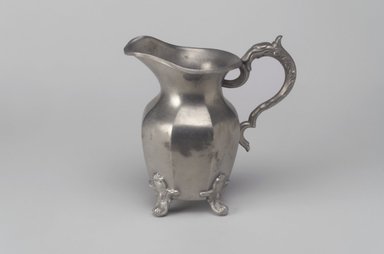 Smith and Feltman. <em>Cream Pitcher or Creamer</em>, 19th century. Pewter, 5 5/8 x 5 5/8 x 3 1/4 in. (14.3 x 14.3 x 8.3 cm). Brooklyn Museum, Gift of Mrs. Samuel Doughty, 27.618. Creative Commons-BY (Photo: Brooklyn Museum, 27.618.jpg)