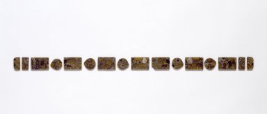  <em>Set of 16 Belt Ornaments (Ttidon)</em>, 19th century. Composite stone or horn, large rectangular pieces: 1 9/16 x 2 5/16 x 3/16 in. (4 x 5.8 x 0.5 cm). Brooklyn Museum, Brooklyn Museum Collection, 27.977.16a-p. Creative Commons-BY (Photo: Brooklyn Museum, 27.977.16a-p.jpg)