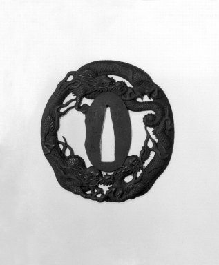  <em>Sword Guard</em>, early 19th century. Iron; slight gilding, 2 13/16 x 2 3/4 x 3/16 in. (7.1 x 7 x 0.4 cm). Brooklyn Museum, Gift of F. Ethel Wickham, 28.613. Creative Commons-BY (Photo: Brooklyn Museum, 28.613_front_bw.jpg)