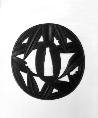 Yedo. <em>Sword Guard</em>, 19th century. Iron and shakudo, 2 3/4 x 2 15/16 in. (7 x 7.5 cm). Brooklyn Museum, Gift of F. Ethel Wickham, 28.696. Creative Commons-BY (Photo: Brooklyn Museum, 28.696_front_bw.jpg)