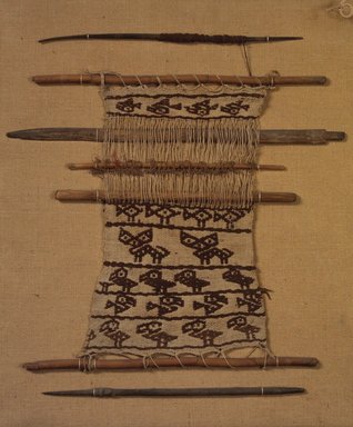 Chimú. <em>Backstrap Loom with Unfinished Textile</em>, 1100-1450. Wood, cotton, camelid fiber, 17 x 16 1/2 x 1/2 in. (43.2 x 41.9 x 1.3 cm). Brooklyn Museum, Museum Collection Fund, 29.1312.13. Creative Commons-BY (Photo: Brooklyn Museum, 29.1312.13.jpg)