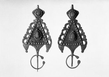  <em>One of a Pair of Bezimas (Shoulder Pins)</em>. Yellowish alloy with settings in silver or coral Brooklyn Museum, Museum Collection Fund, 30.1086.2. Creative Commons-BY (Photo: , 30.1086.2_30.1086.3_bw.jpg)