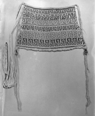 Makushi-Monaiko. <em>Woman's Apron</em>, early 20th century. Glass beads, cotton, seeds, 9 1/8 × 13 3/4 × 3/8 in. (23.2 × 34.9 × 1 cm). Brooklyn Museum, Museum Expedition 1930, Robert B. Woodward Memorial Fund and the Museum Collection Fund, 30.1441. Creative Commons-BY (Photo: Brooklyn Museum, 30.1441_glass_bw.jpg)