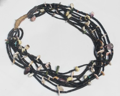 A:shiwi (Zuni Pueblo). <em>Necklace</em>, ca. 1100–1300. Stone, shell, plant fiber, 11 1/2 x 8 1/2 in. (29.2 x 21.6 cm). Brooklyn Museum, Estate of Stewart Culin, Museum Purchase, 30.808. Creative Commons-BY (Photo: Brooklyn Museum, 30.808_installation_PS5.jpg)