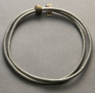 Pygmy, Momou. <em>Leglet with Clasp</em>. Iron wire, brass Brooklyn Museum, Museum Expedition 1931, Robert B. Woodward Memorial Fund, 31.1922. Creative Commons-BY (Photo: Brooklyn Museum, 31.1922_side_PS10.jpg)
