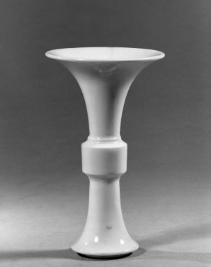  <em>Wine Vessel (Gu)</em>, 1662–1772. Porcelain, glaze, 5 7/16 x 3 1/8 x 7 5/8 in. (13.8 x 8 x 19.4 cm). Brooklyn Museum, Gift of the executors of the Estate of Colonel Michael Friedsam, 32.1138. Creative Commons-BY (Photo: Brooklyn Museum, 32.1138_acetate_bw.jpg)