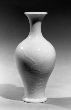  <em>Vase</em>, first half of 18th century. Porcelain, glaze, 7 5/16 x 3 9/16 in. (18.5 x 9 cm). Brooklyn Museum, Gift of the executors of the Estate of Colonel Michael Friedsam, 32.1142. Creative Commons-BY (Photo: Brooklyn Museum, 32.1142_acetate_bw.jpg)