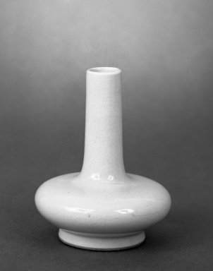  <em>Small Bottle Shaped Vase</em>, 18th century. Porcelain, glaze, 4 1/16 x 3 3/8 in. (10.3 x 8.5 cm). Brooklyn Museum, Gift of the executors of the Estate of Colonel Michael Friedsam, 32.1172. Creative Commons-BY (Photo: Brooklyn Museum, 32.1172_bw.jpg)