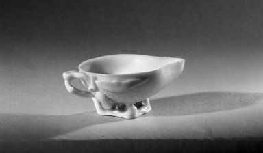  <em>Cup in the Shape of Lichi Nut</em>, 17th century. Porcelain, glaze, 1 9/16 x 3 3/4 in. (3.9 x 9.6 cm). Brooklyn Museum, Gift of the executors of the Estate of Colonel Michael Friedsam, 32.1174. Creative Commons-BY (Photo: Brooklyn Museum, 32.1174_acetate_bw.jpg)
