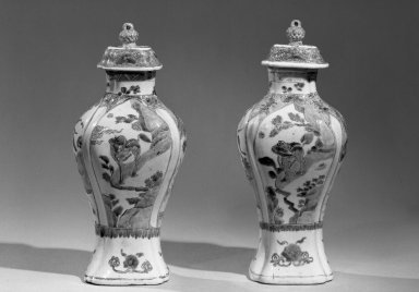  <em>Jar with Cover</em>, 1662-1772. Porcelain with polychrome overglaze enamel (wucai) decoration, 12 3/8 x 5 3/8 in. (31.5 x 13.7 cm). Brooklyn Museum, Gift of the executors of the Estate of Colonel Michael Friedsam, 32.1190.1a-b. Creative Commons-BY (Photo: , 32.1190.1_2_acetate_bw.jpg)