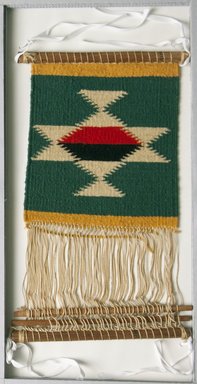 Navajo. <em>Loom with Weaving</em>. Wool, cotton, wood Brooklyn Museum, Bequest of W.S. Morton Mead, 32.2099.32552. Creative Commons-BY (Photo: Brooklyn Museum, 32.2099.32552_PS5.jpg)